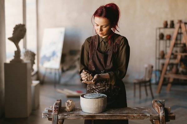 Quelles croisières proposent des ateliers de sculpture sur sable avec des artistes locaux?